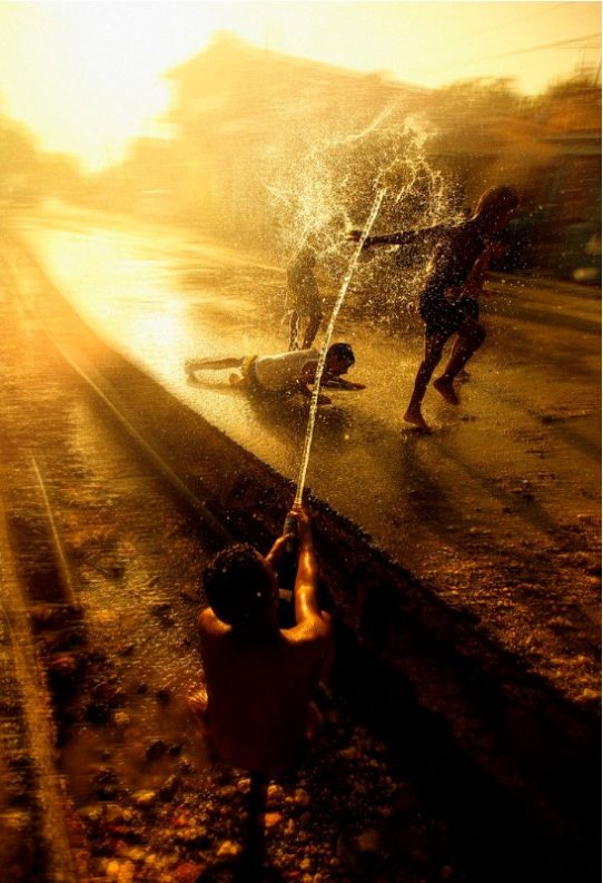 Water Fight by Adam Docker